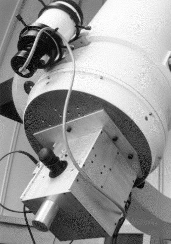 [IMAGE: polarimeter mounted on the telescope]
